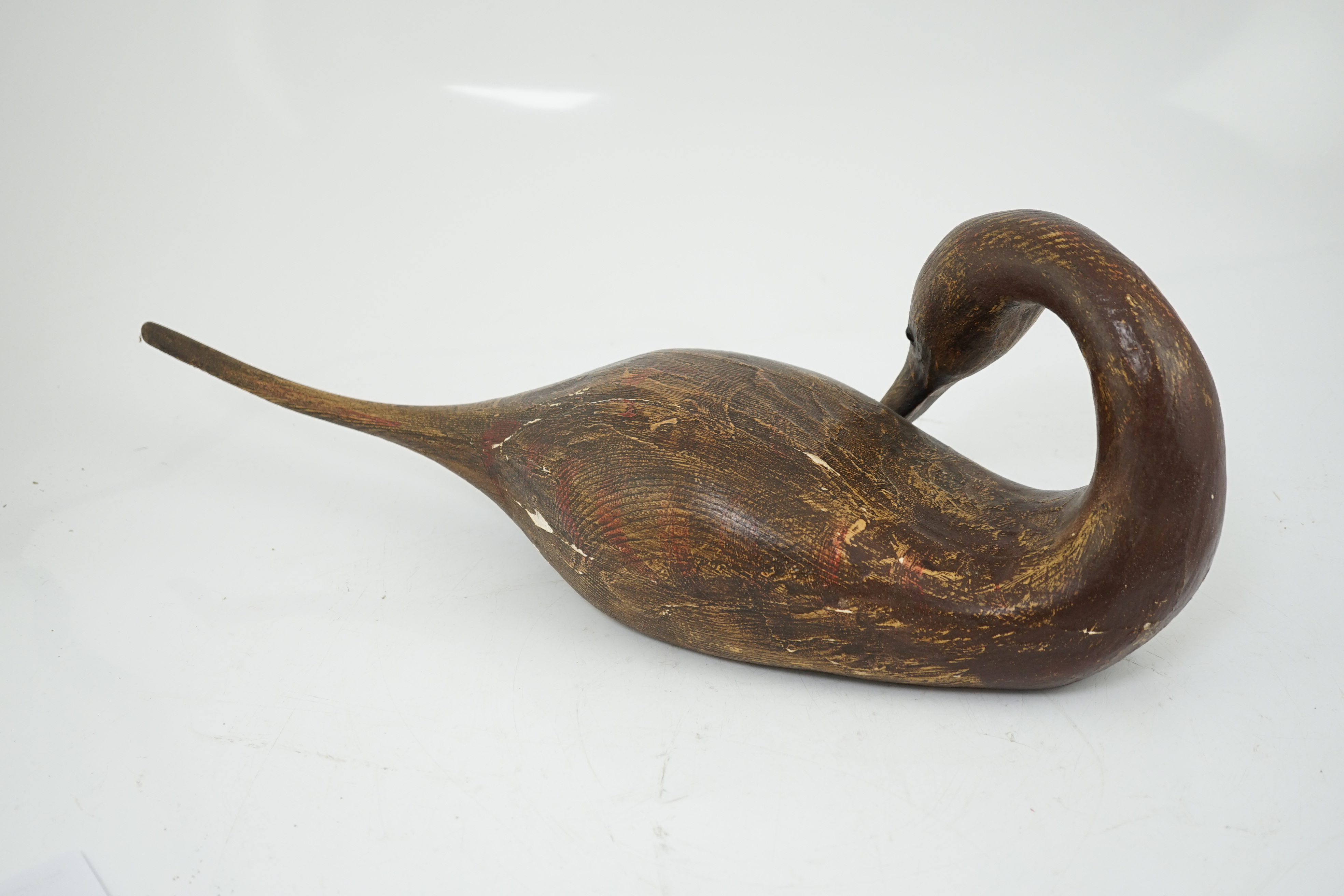 Guy Taplin (British, b.1939), a carved and painted wood figure of a pintail duck